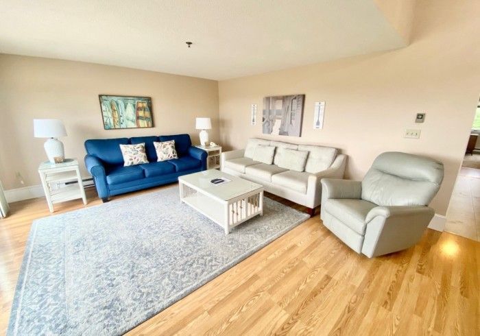 Living room of a premium two-bedroom suite at Village by the Sea, Wells, Maine